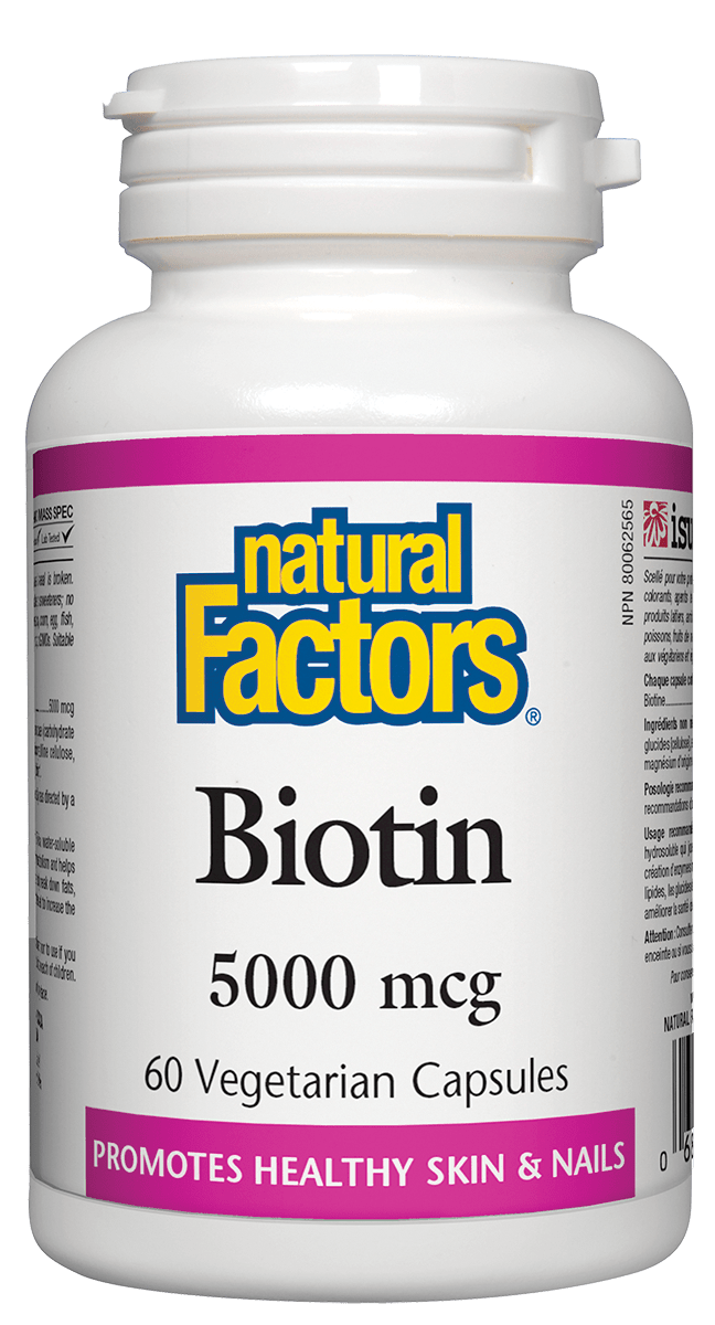 A bottle of Natural Factors Biotin supplements with 5000 mcg per capsule, in a white container with a pink and yellow label.
